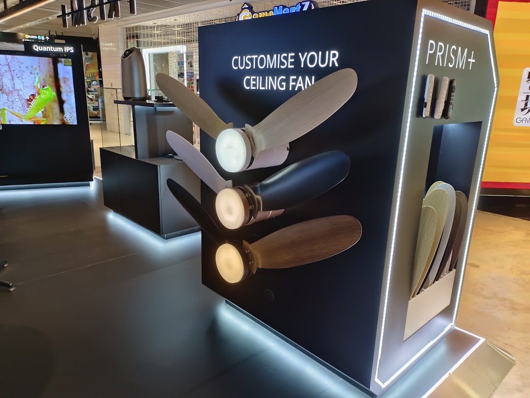 A modern display showcasing customizable ceiling fans with various blade options and integrated lighting at PRISM Funan.