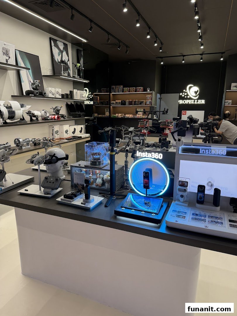 Interior view of Propeller - Funan, showcasing drones, cameras, and tech gadgets on display.