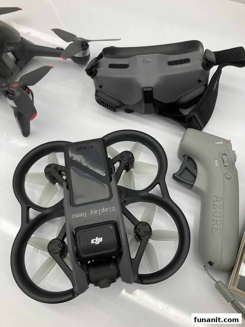 A display of DJI FPV and Avata drones with goggles and motion controller.