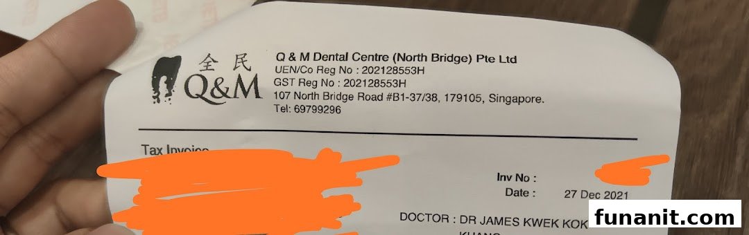 A close-up of an invoice from Q & M Dental Centre (North Bridge) Pte Ltd.