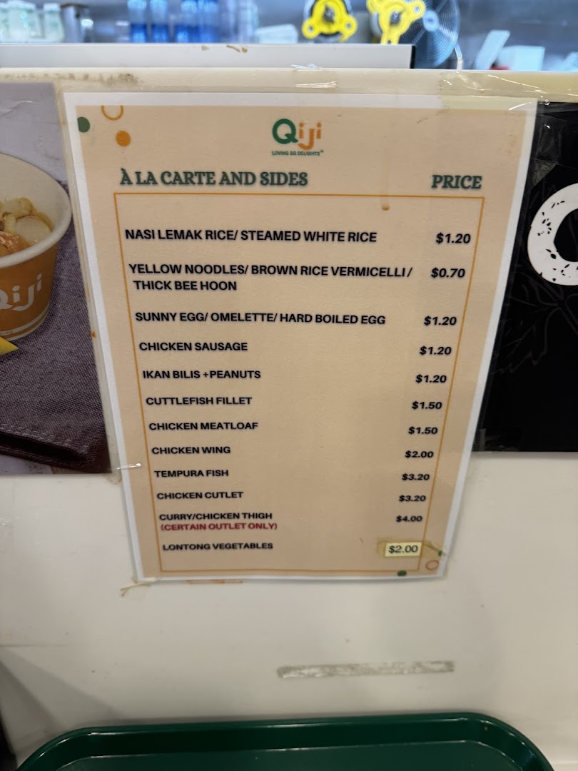 A close-up view of Qiji's 'À La Carte and Sides' menu with item names and prices.