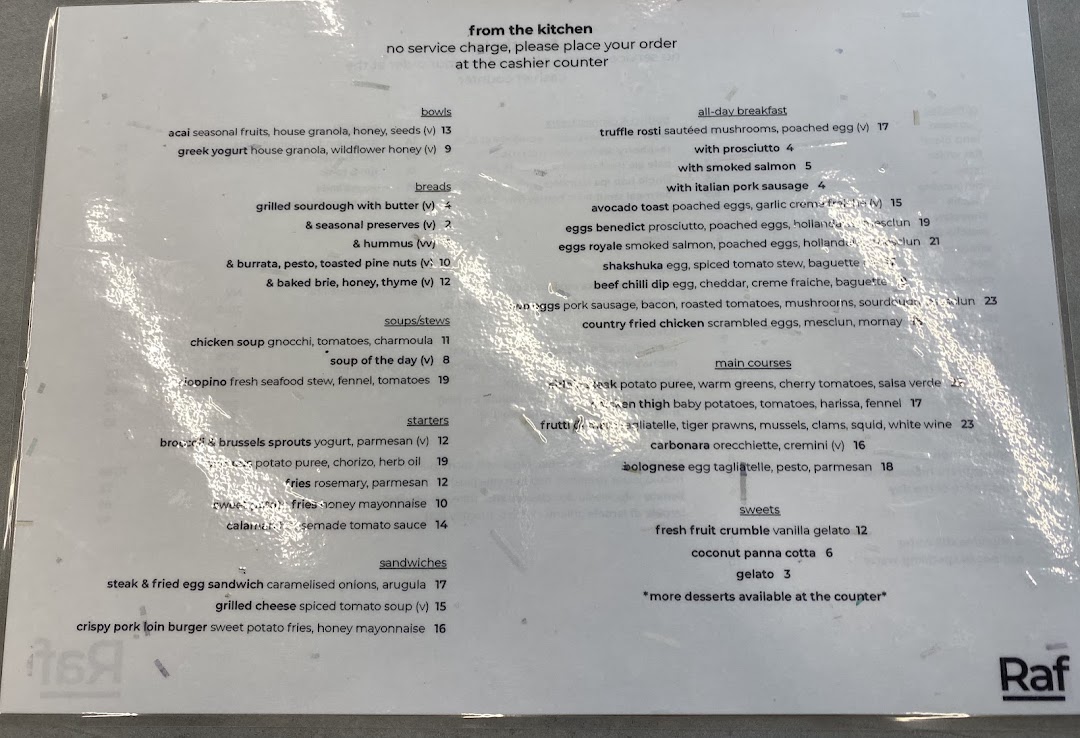 A detailed menu displaying various food and drink options with prices.