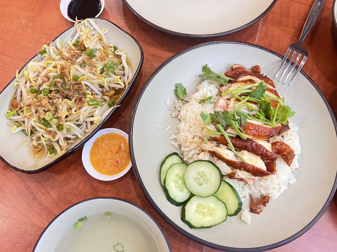 Delicious roasted chicken rice, bean sprouts, and soup served at Raffles Coffee and Toast.