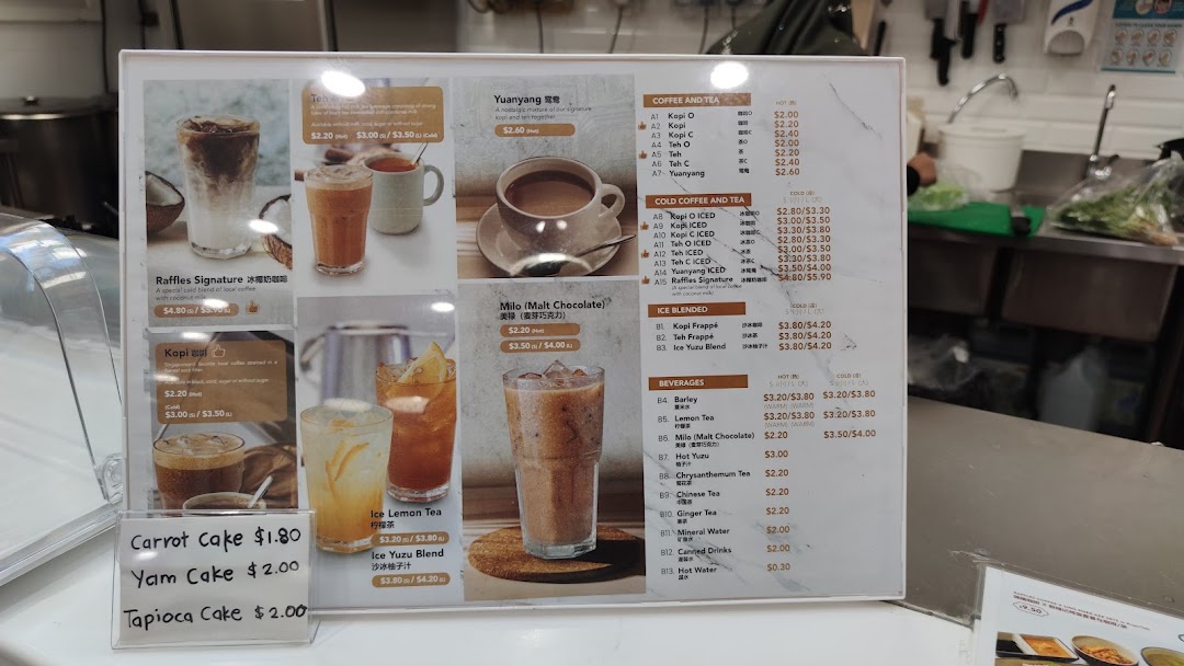 A detailed menu board displaying a variety of coffee, tea, blended drinks, and cakes.