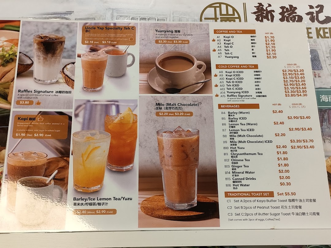 A detailed menu board displaying a variety of coffee, tea, beverages, and traditional toast sets.
