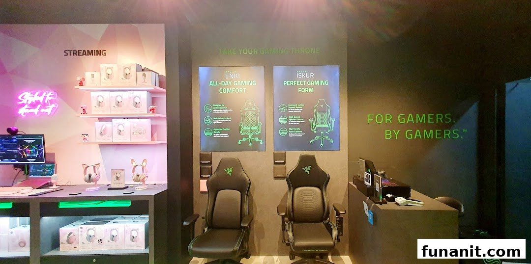 Interior view of RazerStore Funan showcasing gaming chairs, streaming gear, and product displays.