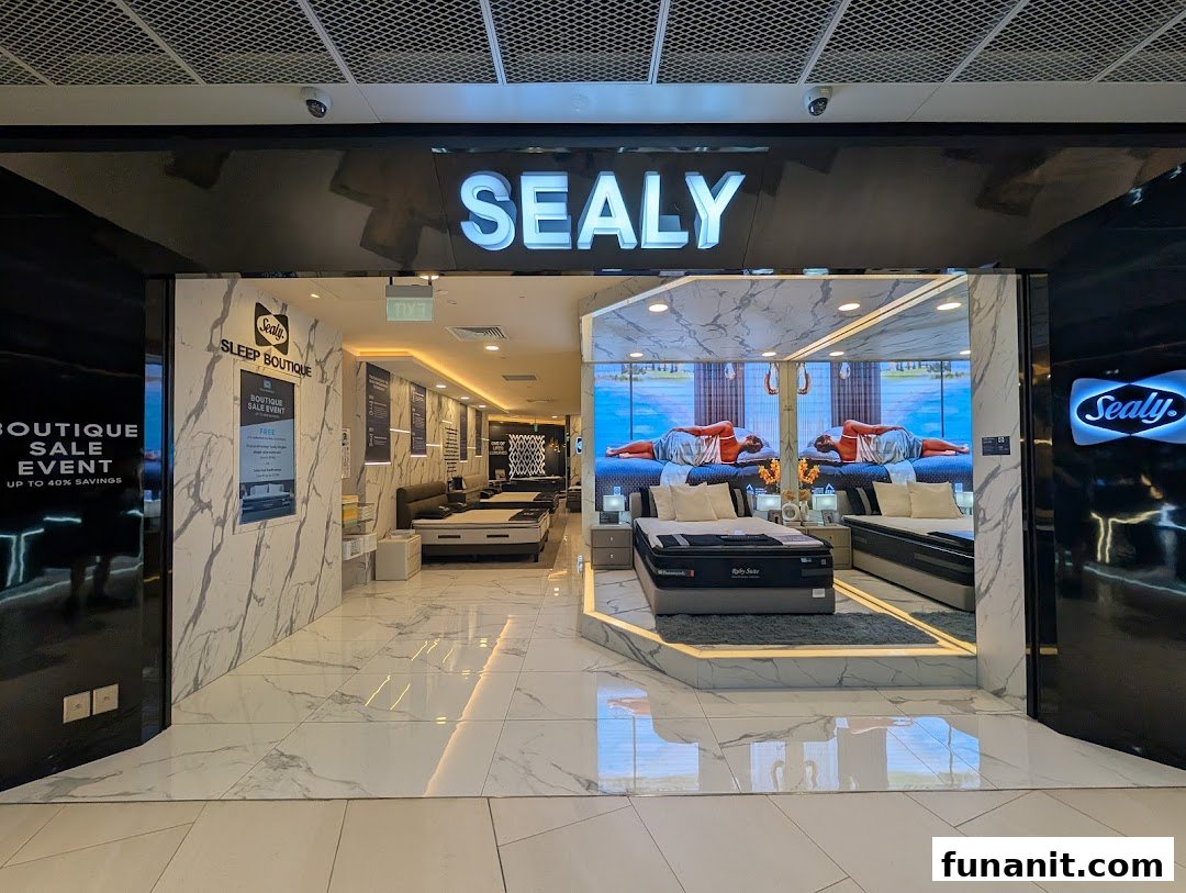 The Sealy Sleep Boutique entrance showcases luxurious beds and mattresses, inviting customers to explore sleep solutions.