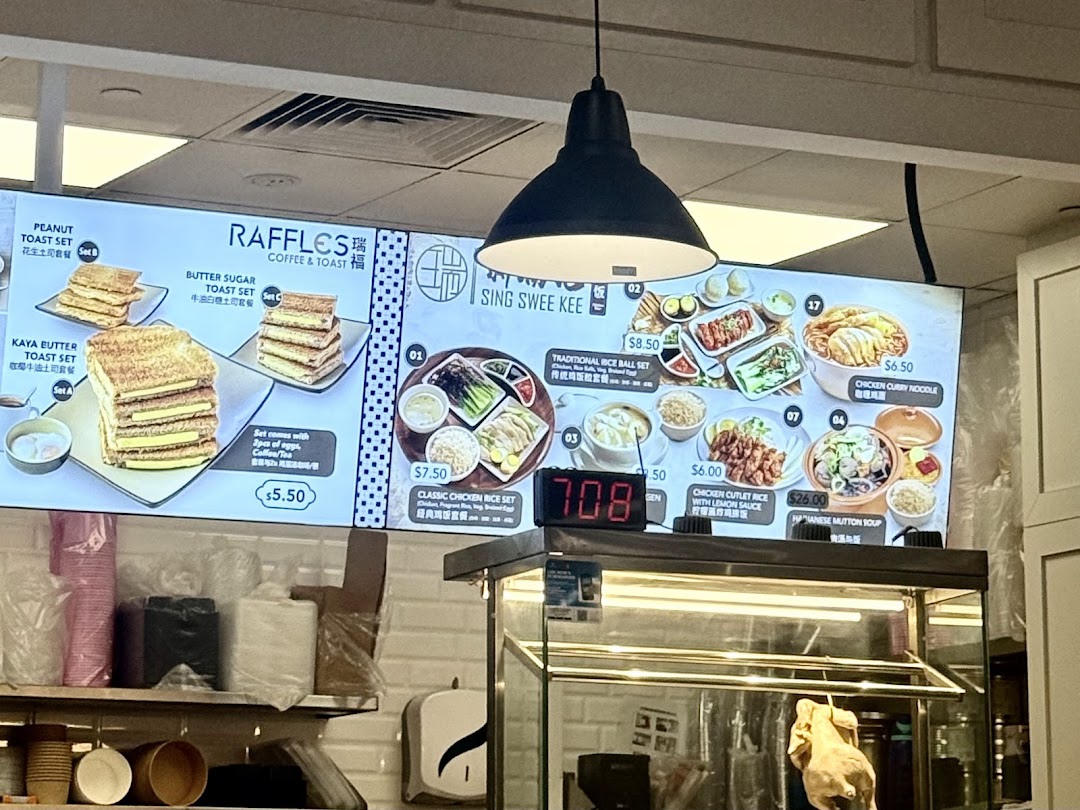 Digital menu boards displaying various toast sets from Raffles Coffee & Toast and main dishes from Sing Swee Kee.