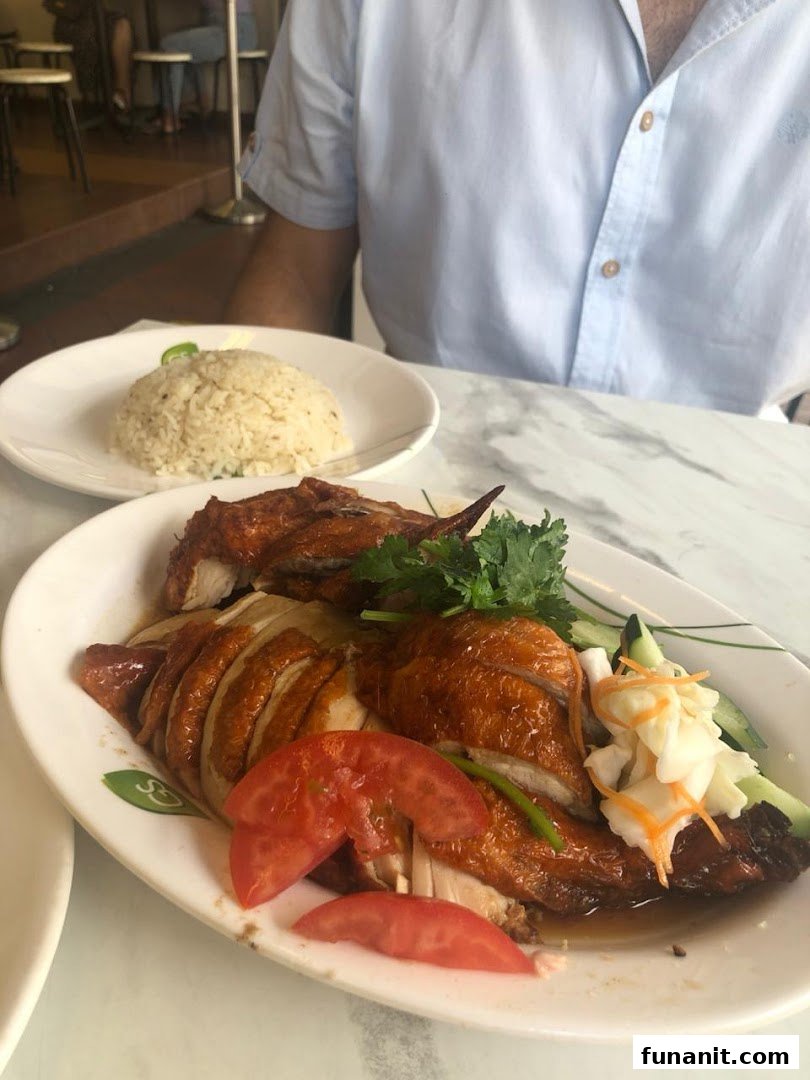 A plate of delicious roasted chicken and rice served at Sing Swee Kee.