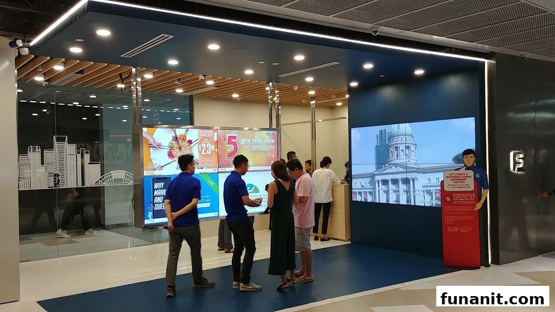 Customers engage with digital displays at the modern Singapore Pools Funan branch entrance.