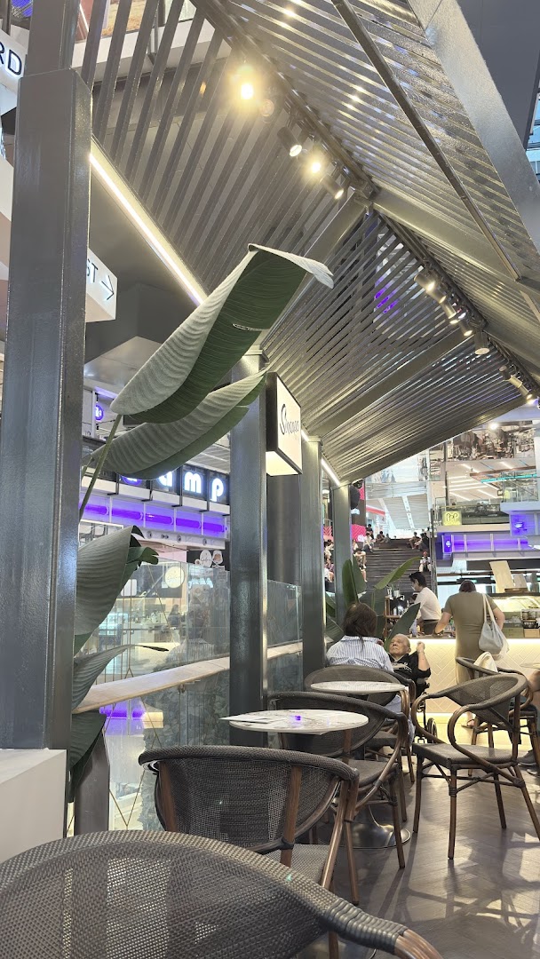 Interior view of Sinpopo Coffee Funan, featuring comfortable seating and a relaxed ambiance.