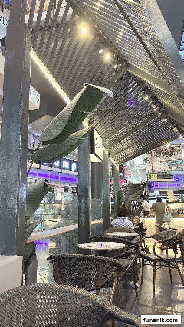 Interior view of Sinpopo Coffee Funan, featuring comfortable seating and a relaxed ambiance.
