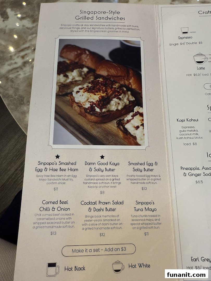 A menu page from Sinpopo Coffee featuring Singapore-style grilled sandwiches and beverages.