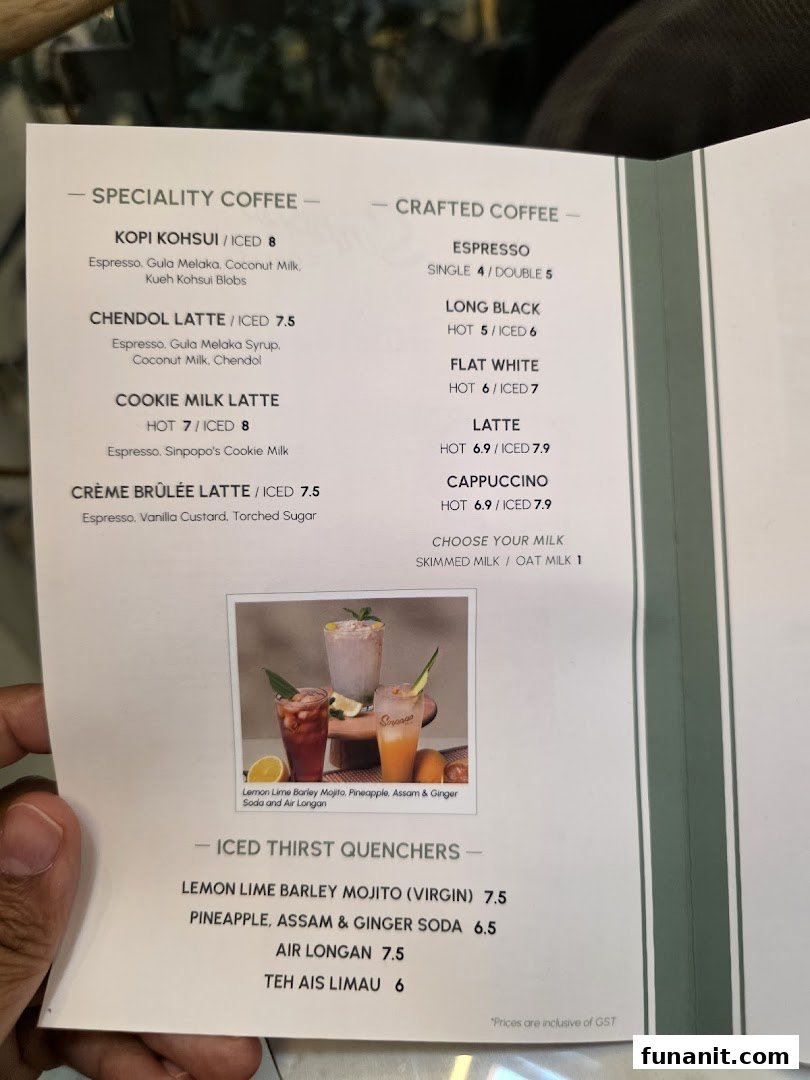A close-up of Sinpopo Coffee's menu, featuring specialty coffees, crafted coffees, and iced thirst quenchers.