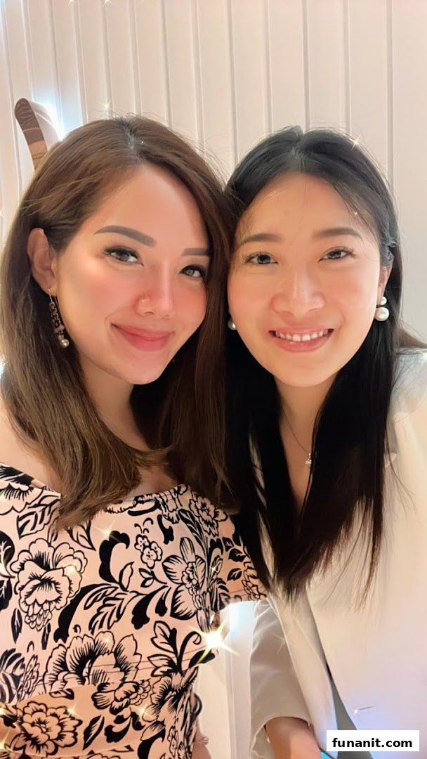 Two smiling women posing for a close-up photo, likely at Skin Belief.