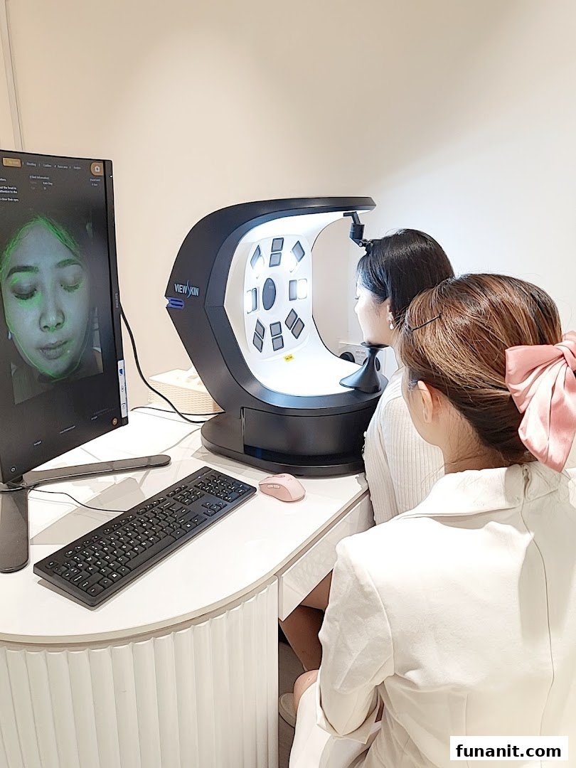 A customer undergoes a detailed skin analysis using advanced technology at Skin Belief.