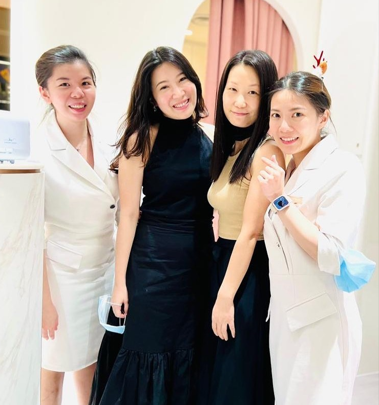 Four smiling women, likely staff or customers, inside the Skin Belief Funan store.