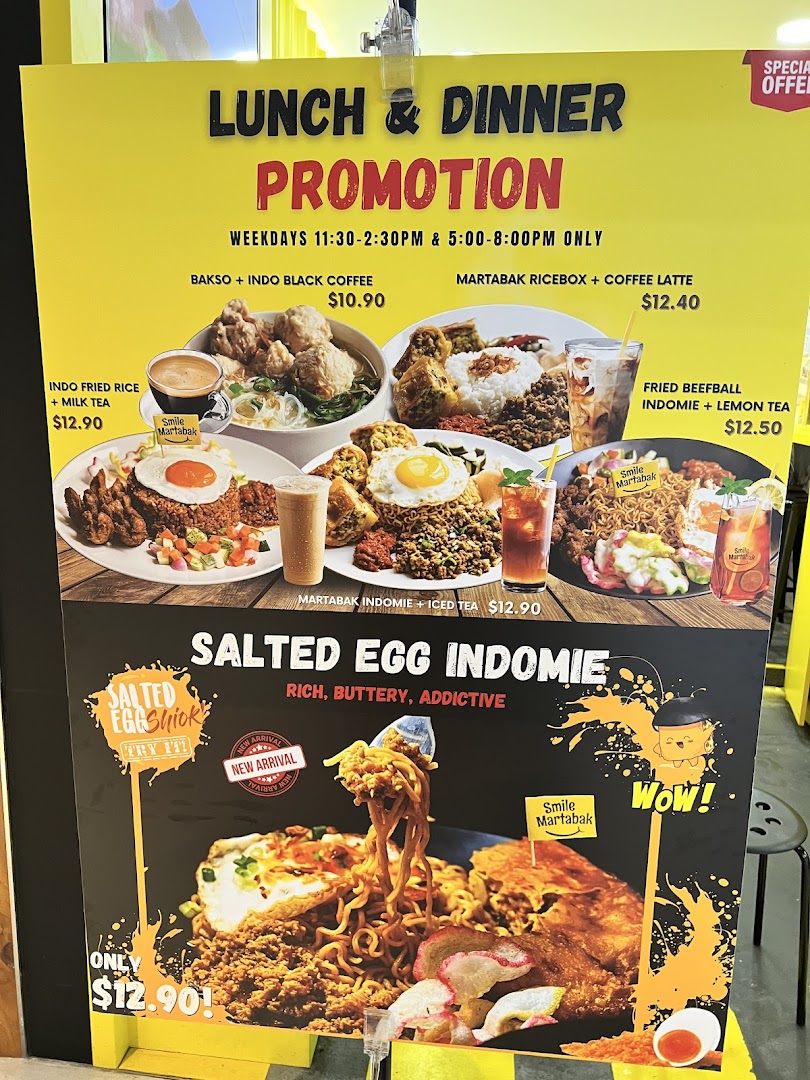 A promotional board displaying various Indonesian food and drink sets with prices and a special salted egg Indomie dish.