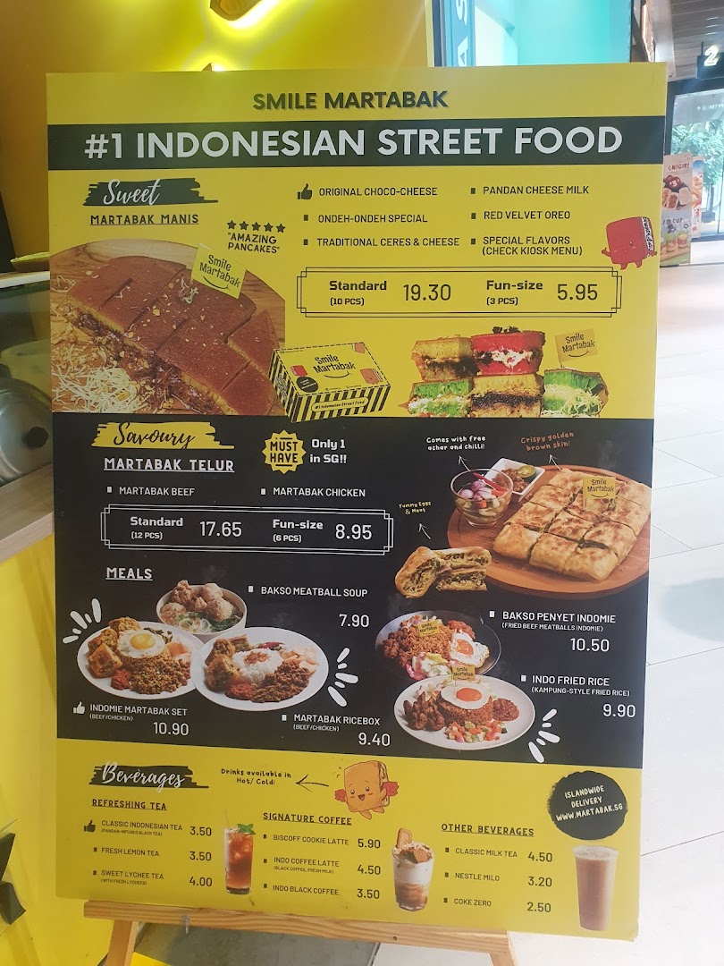A vibrant menu board displaying Indonesian street food, including sweet and savoury martabak, meals, and beverages.
