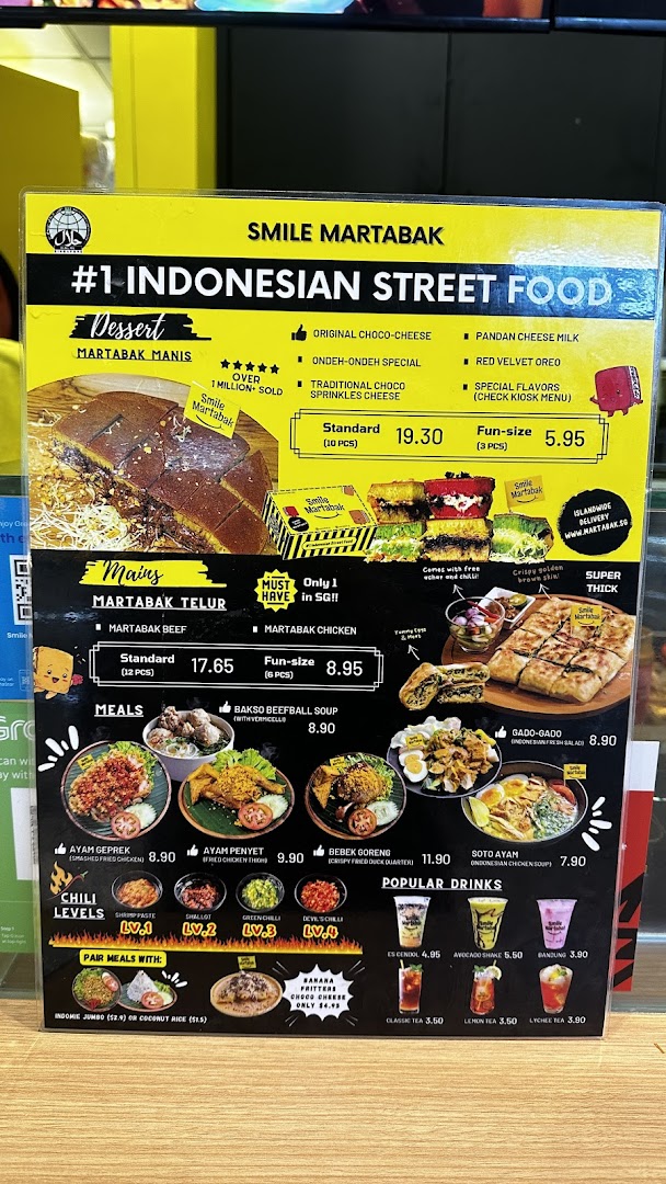 A vibrant menu board for Smile Martabak, showcasing a variety of Indonesian street food, desserts, mains, and drinks.