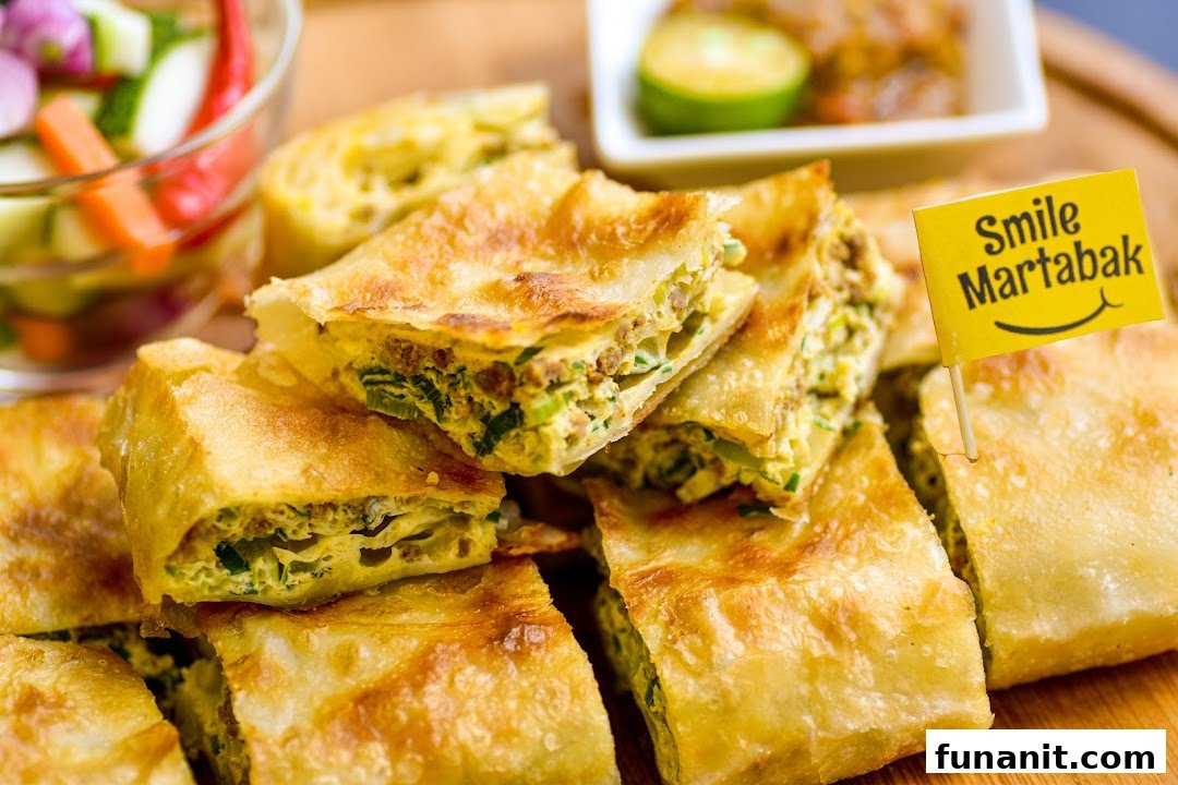 Deliciously golden martabak slices, served with a Smile Martabak flag and side condiments.