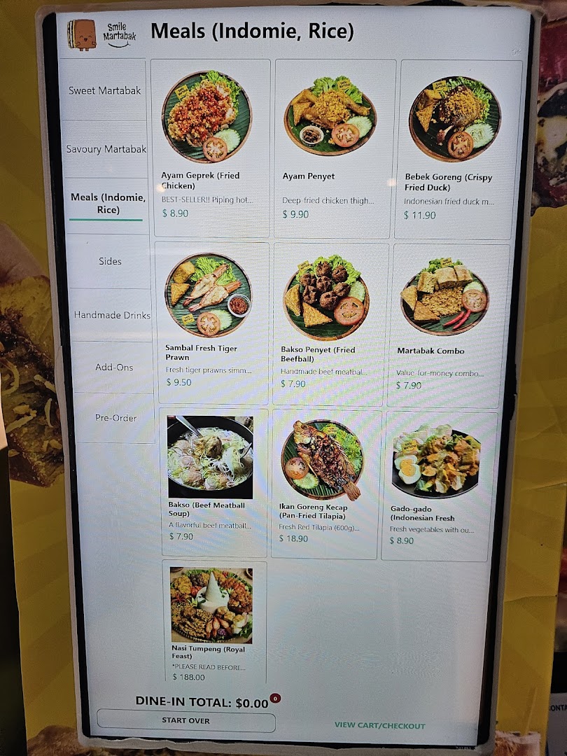 A digital menu display from Smile Martabak, showcasing a variety of Indonesian meals.