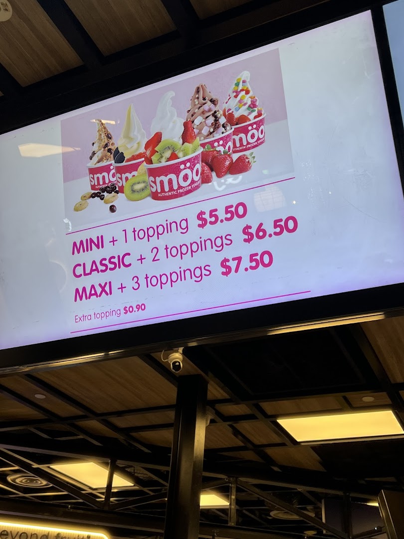 A digital menu board for smöoy frozen yogurt, displaying various sizes and prices.