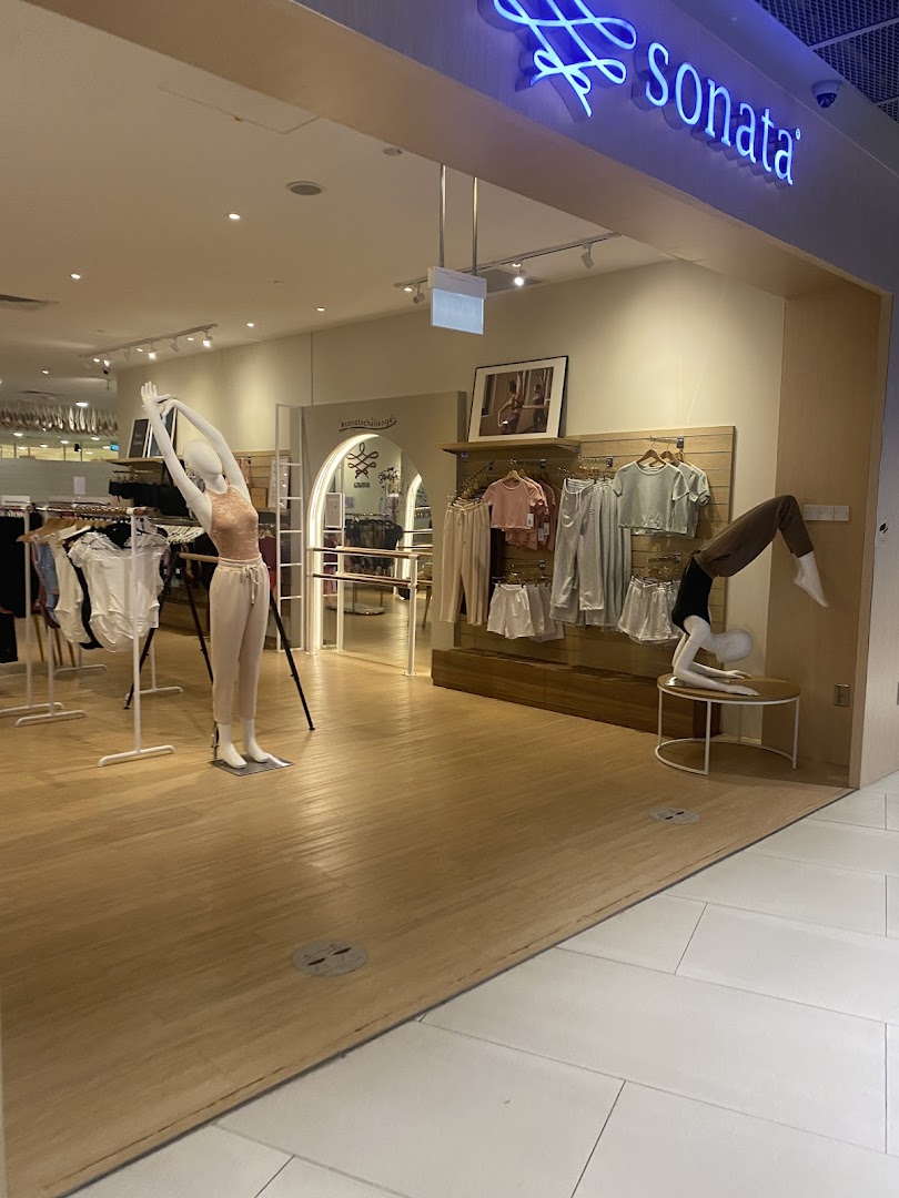 Interior view of Sonata Flagship Store featuring activewear on mannequins and displays.