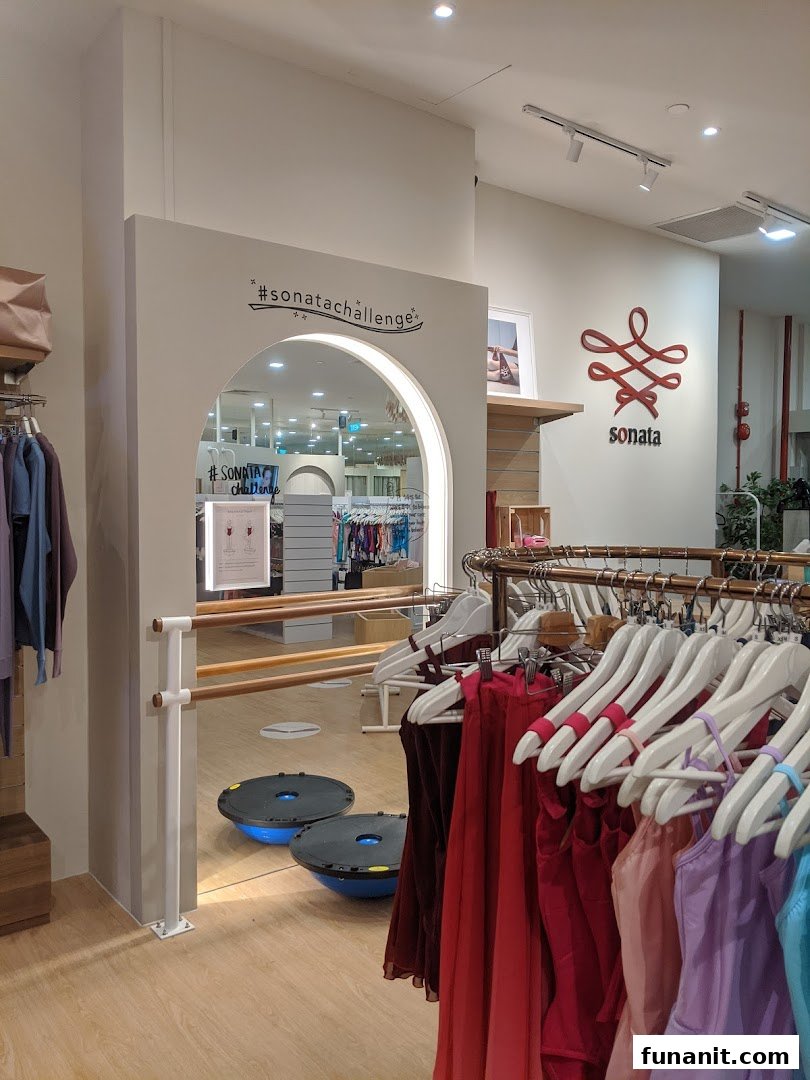 Interior view of Sonata Flagship Store, showcasing colorful dancewear, ballet barre, and fitness equipment.