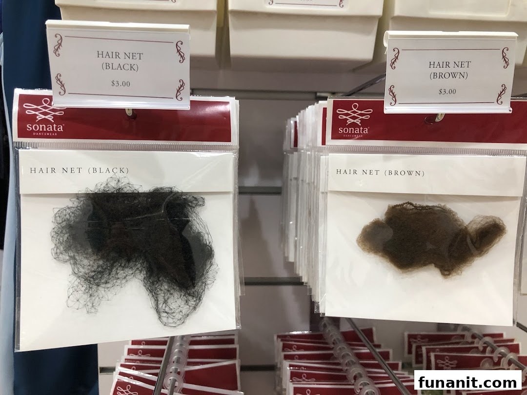Close-up of black and brown hair nets displayed for sale at Sonata Dancewear.