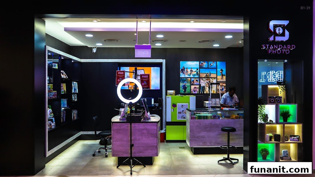 Interior view of Standard Photo Funan, showcasing photo printing services, personalized gifts, and a modern setup.