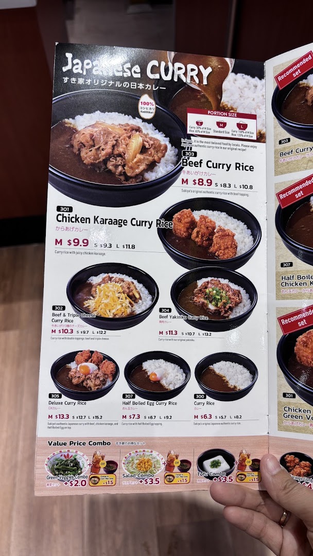A detailed menu page from Sukiya featuring various Japanese curry dishes and combo options.