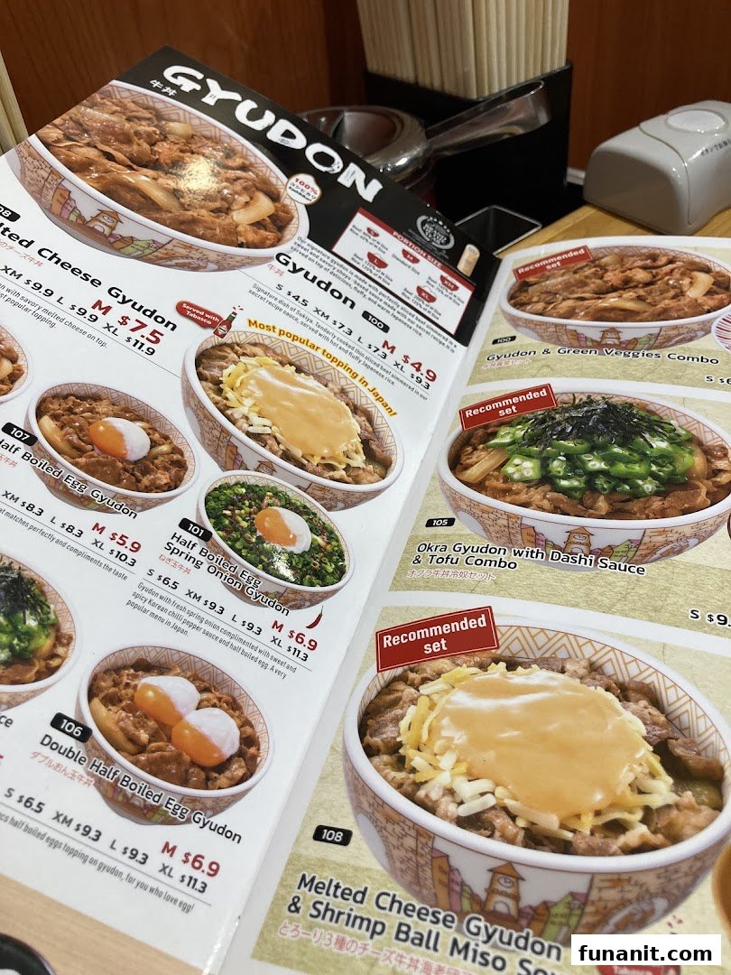 A close-up view of a Sukiya menu displaying various Gyudon dishes and their prices.
