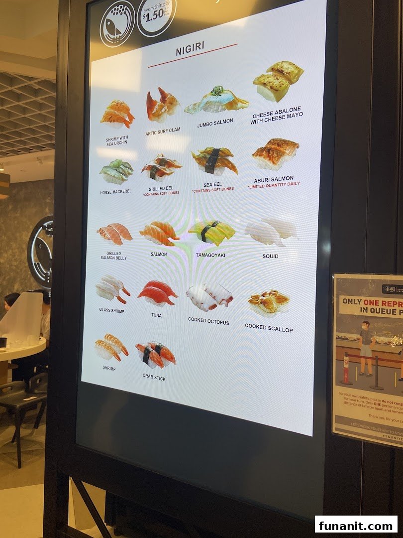 A digital menu board displaying various nigiri sushi options with prices at Sushi Express.