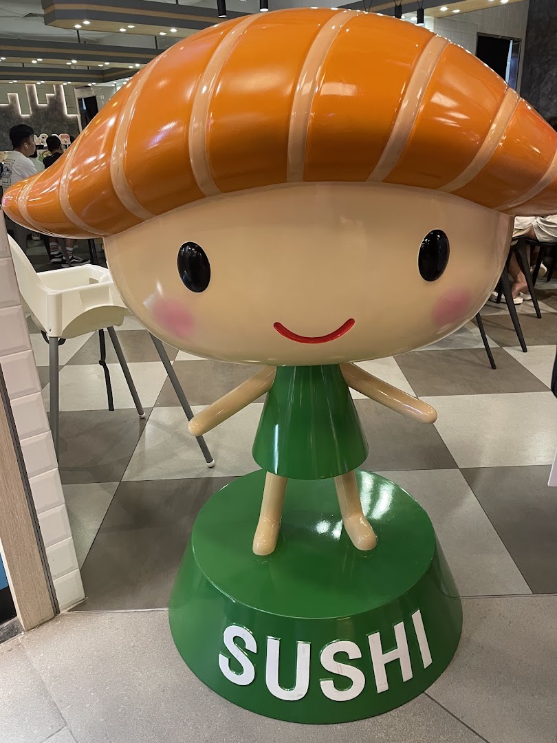 A large, friendly sushi mascot statue welcomes visitors to Sushi Express.