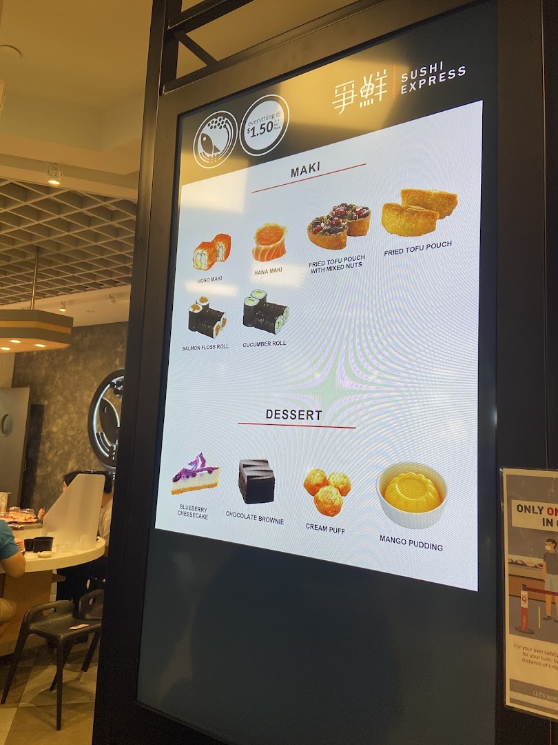 Digital menu board for Sushi Express, showcasing various sushi rolls and desserts with pricing.