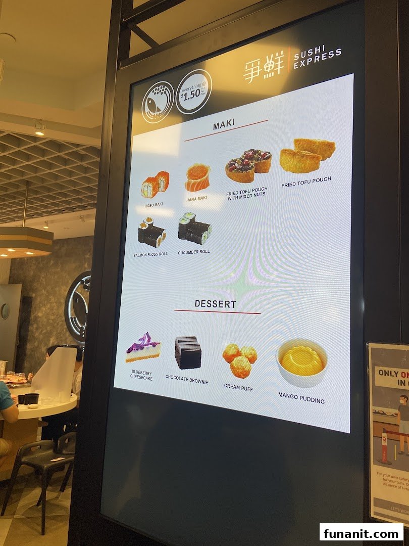 Digital menu board for Sushi Express, showcasing various sushi rolls and desserts with pricing.