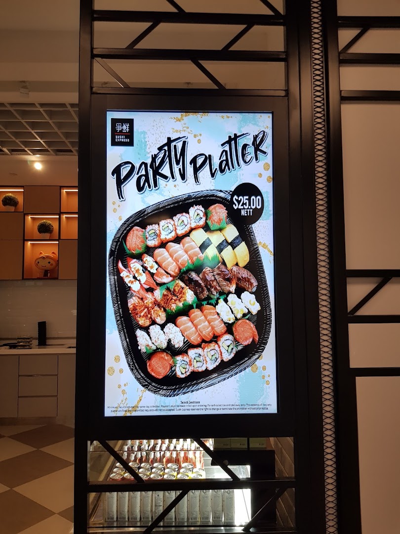 A digital display at Sushi Express Funan showcasing a Party Platter for $25.00 nett.