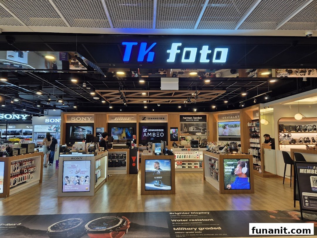 An interior view of TK Foto Technic, showcasing a wide range of cameras, audio equipment, and electronics.