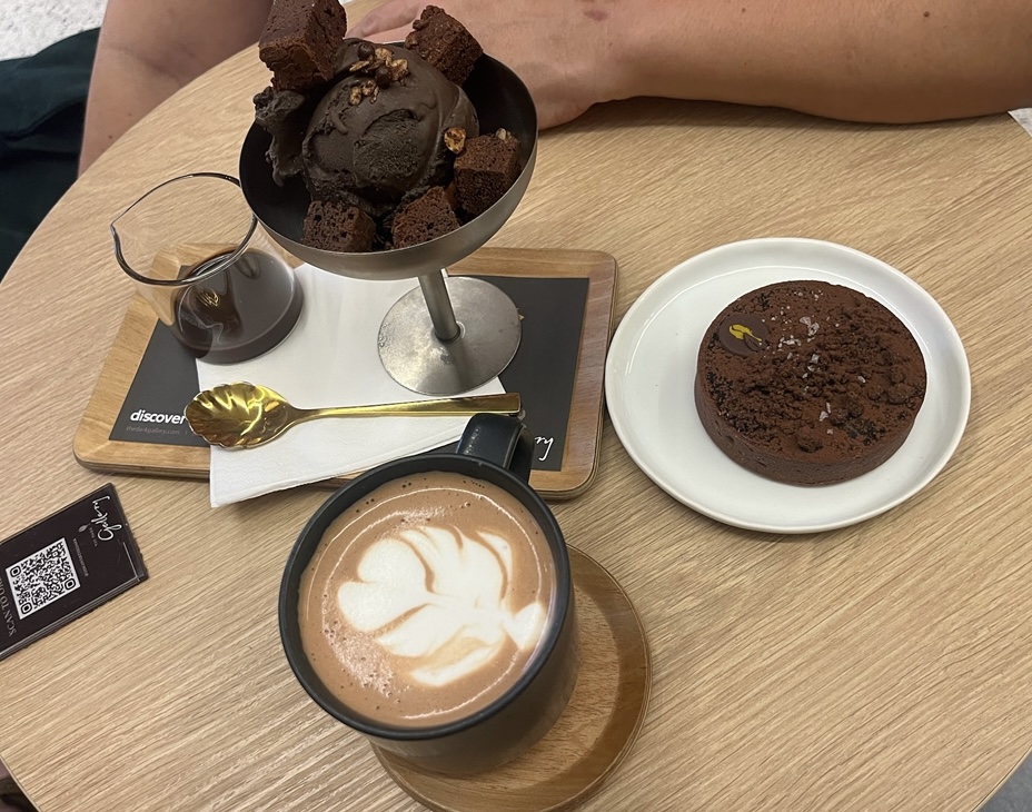 Decadent chocolate ice cream, tart, and hot chocolate served at The Dark Gallery.