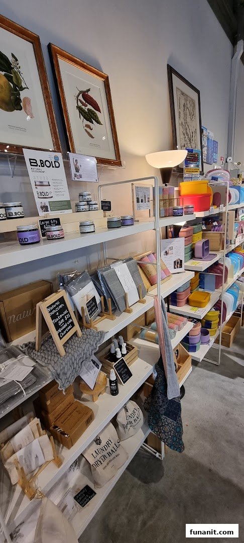 Shelves display a variety of eco-friendly home and personal care products, including natural deodorants and laundry items.