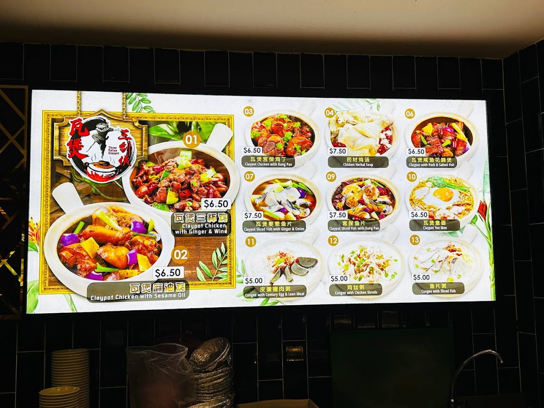 A vibrant menu board showcasing delicious claypot dishes, soups, and congee with prices.