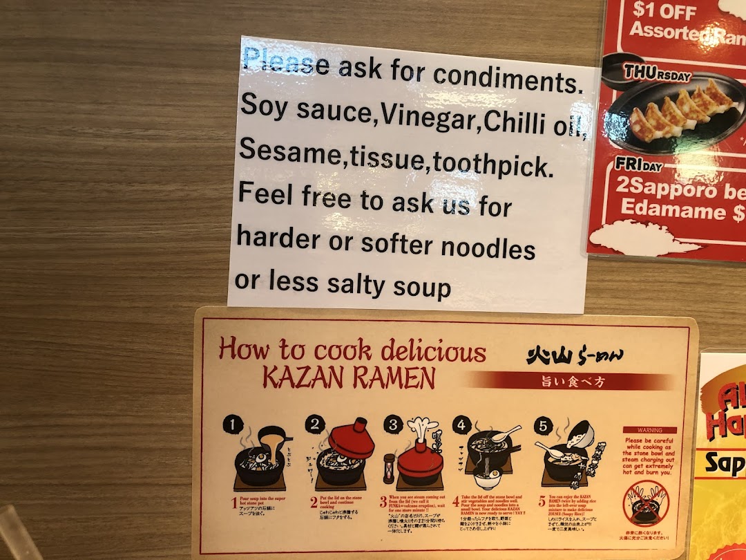 Image shows instructions for cooking Kazan Ramen, condiment options, and daily promotional offers.