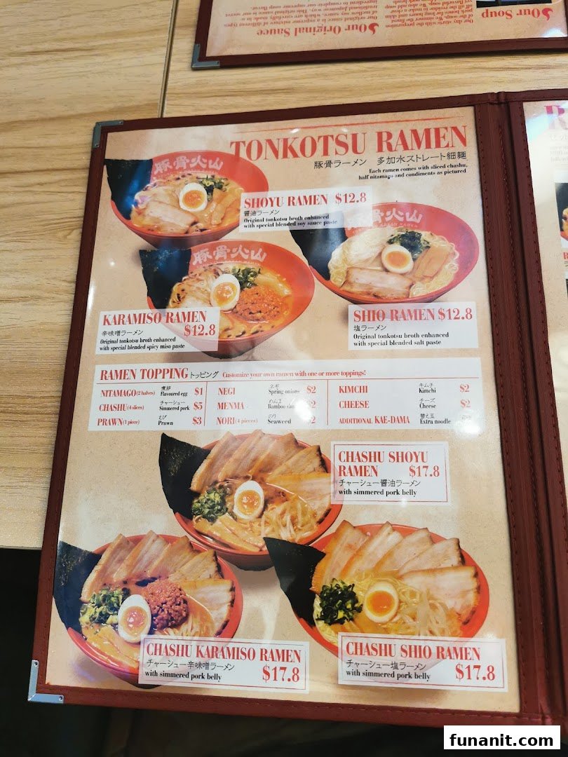 A detailed menu displaying various ramen types, toppings, and prices.