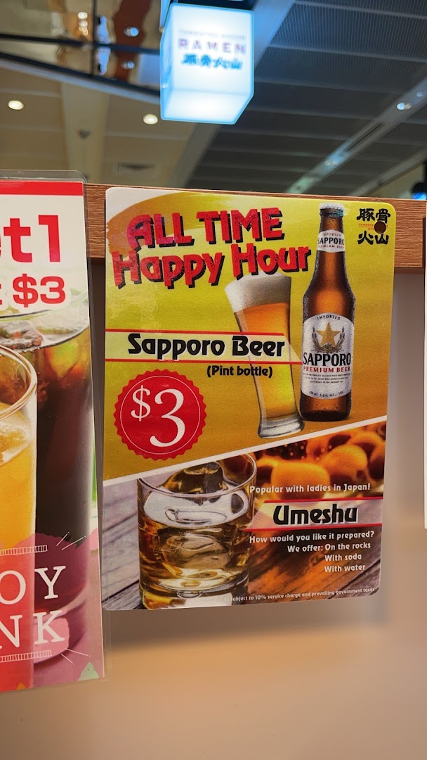 A promotional poster for Tonkotsu Kazan's 'All Time Happy Hour' featuring Sapporo Beer and Umeshu.