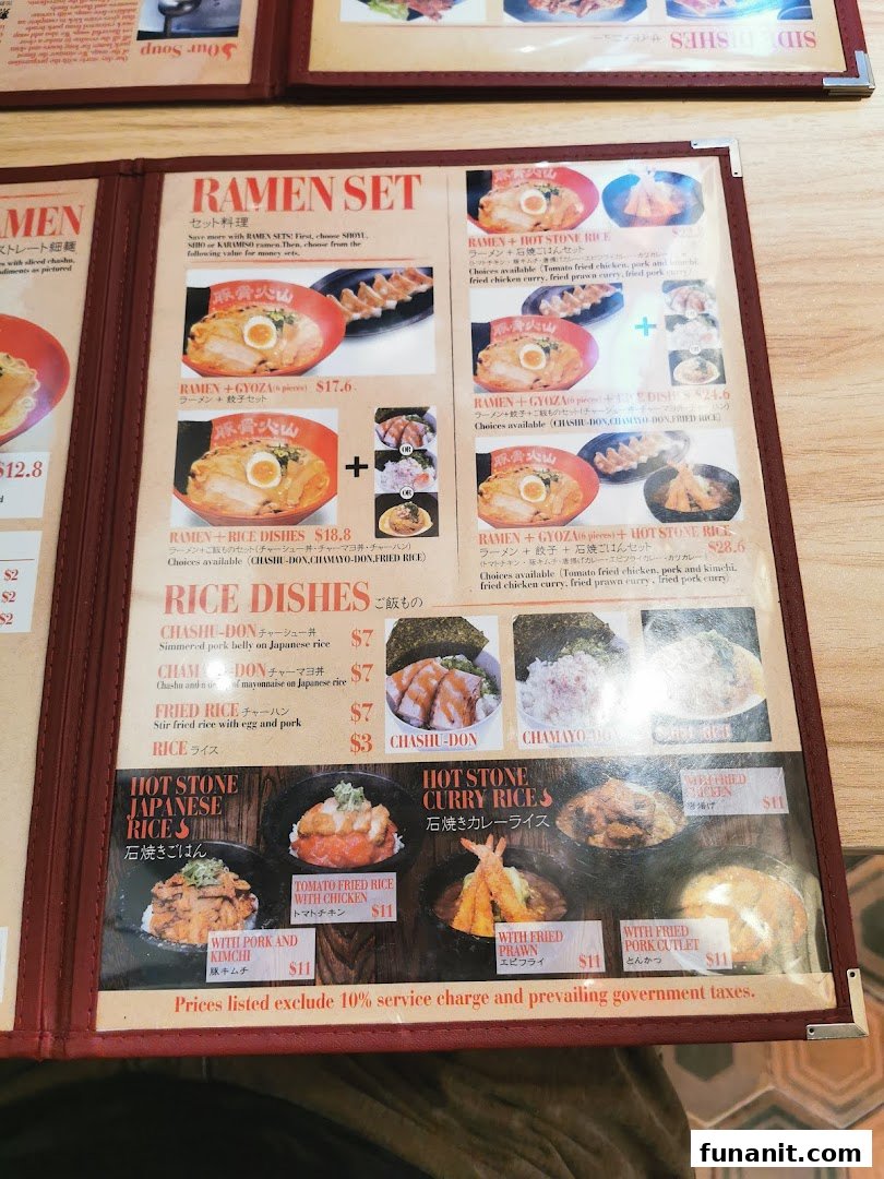 A detailed menu displaying various ramen sets, rice dishes, and hot stone rice options.