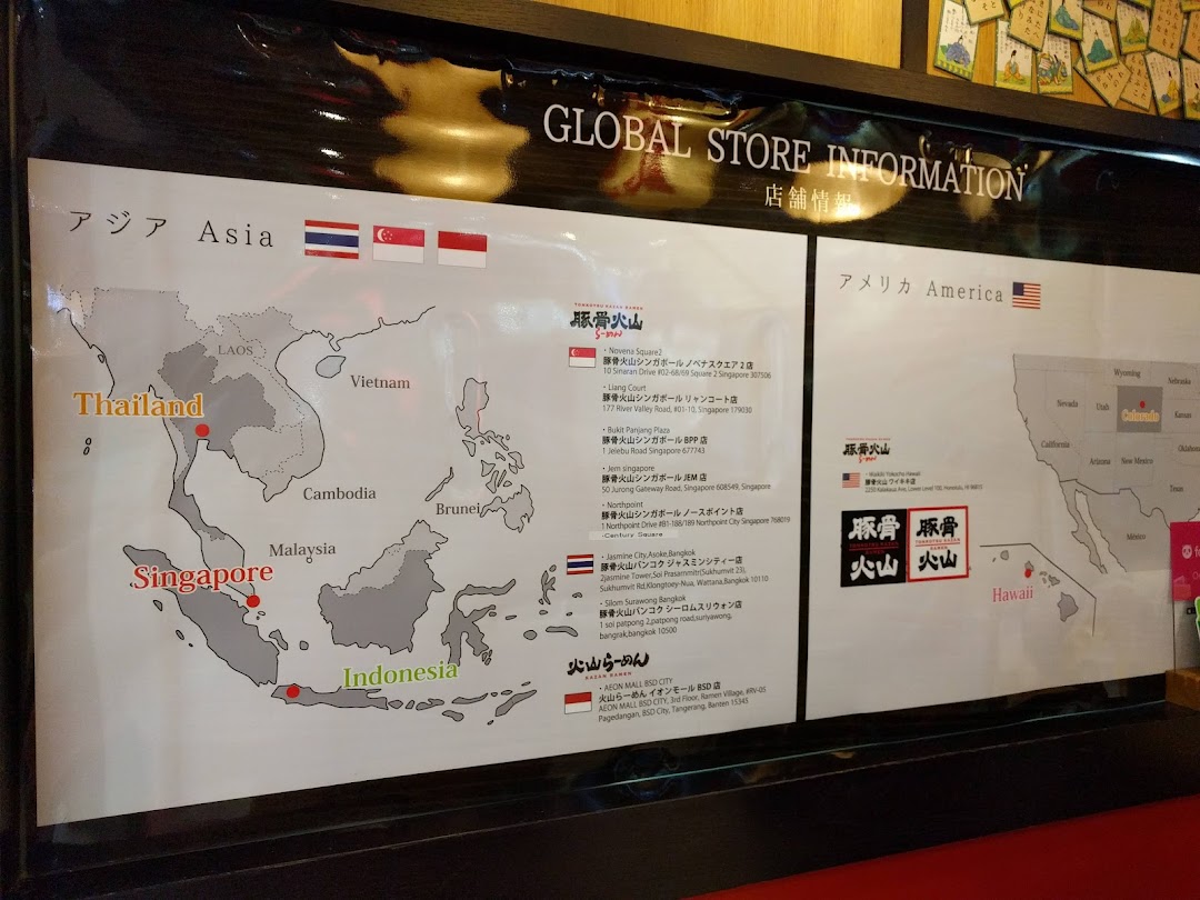 A global store information board displaying Tonkotsu Kazan Ramen's international locations across Asia and America.