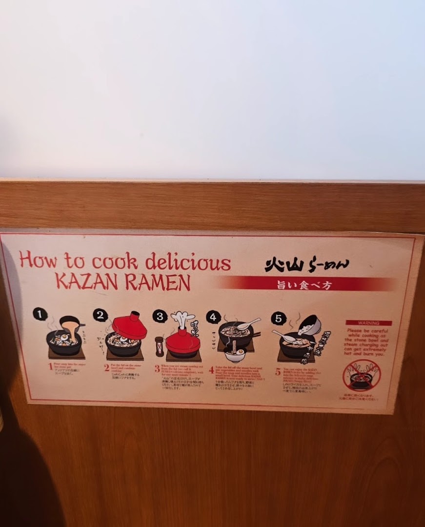 An instructional poster detailing how to cook delicious Kazan Ramen in a hot stone bowl.