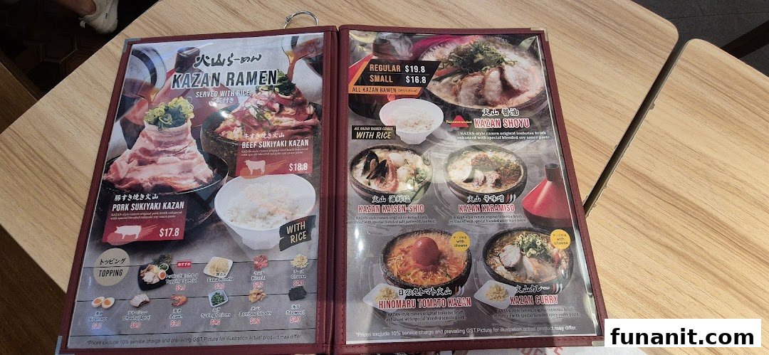 A detailed menu displaying various ramen dishes, including Sukiyaki Kazan and specialty ramen, with prices and toppings.
