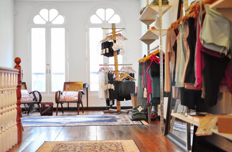 An inviting interior view of 'Touch The Toes' boutique, showcasing activewear and comfortable apparel in a bright, airy space.